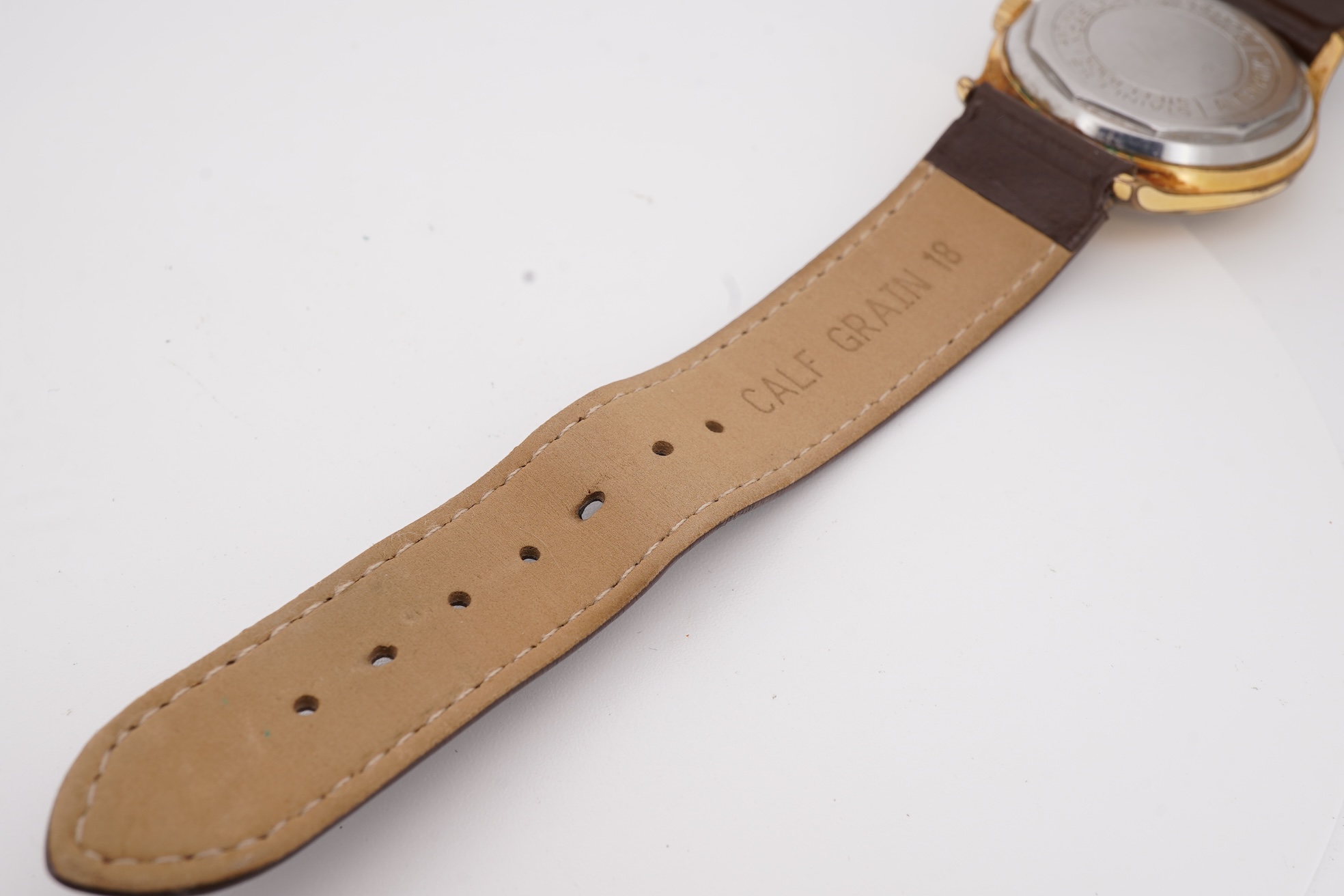 A gentleman's steel and gold plated Montfort Superautomatic wrist watch, with Roman and quarterly Arabic numerals, case diameter 34mm, on a later associated leather strap.